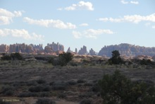 The Needles in Canyonlands way in the distance